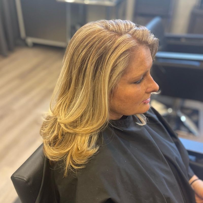 Layered Hair with Blonde Highlights