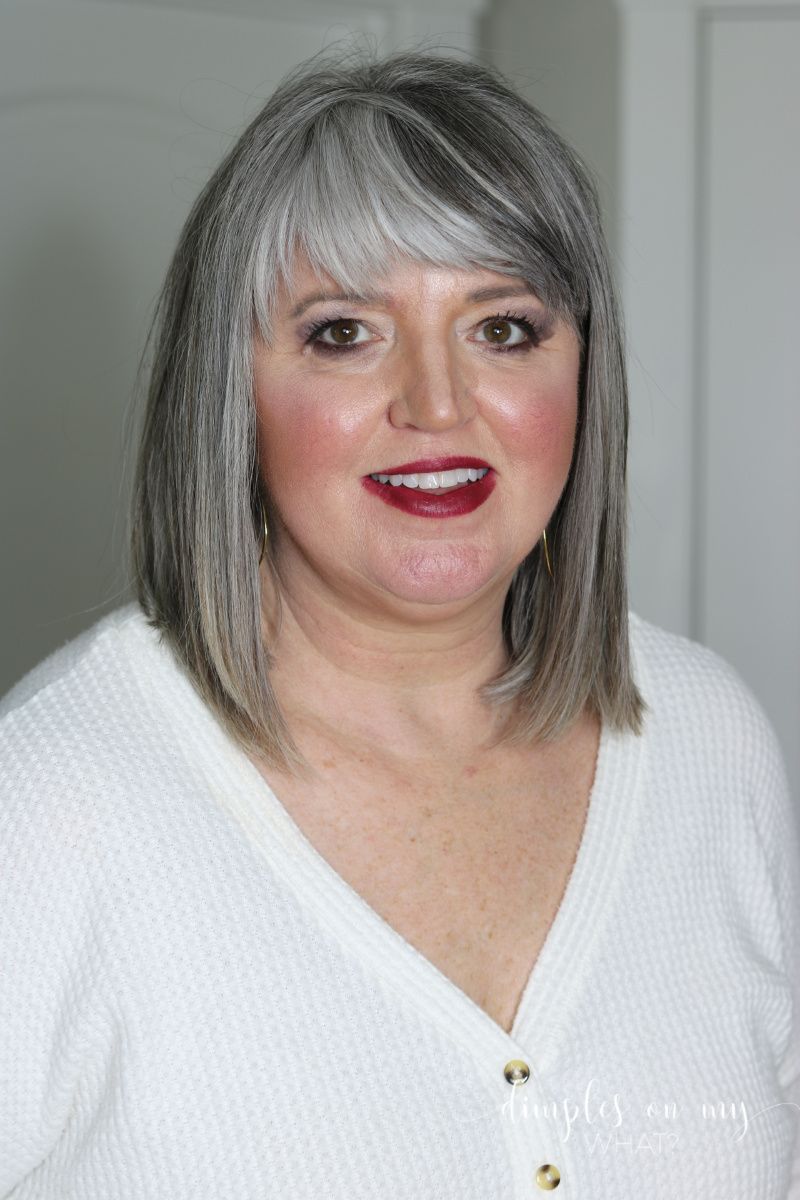 Blunt, Heavy Bangs Highlight Hooded Eyes