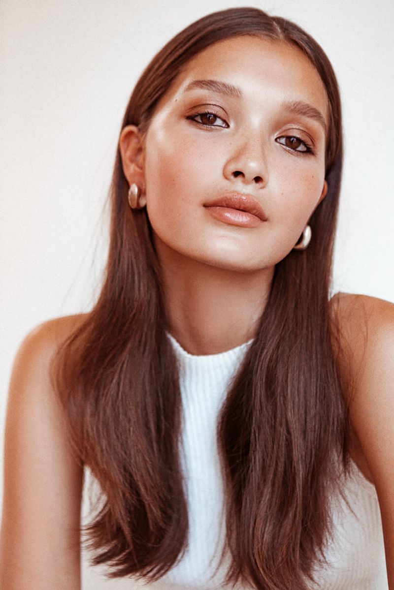 Styling Error: Tucking Hair Behind Both Ears