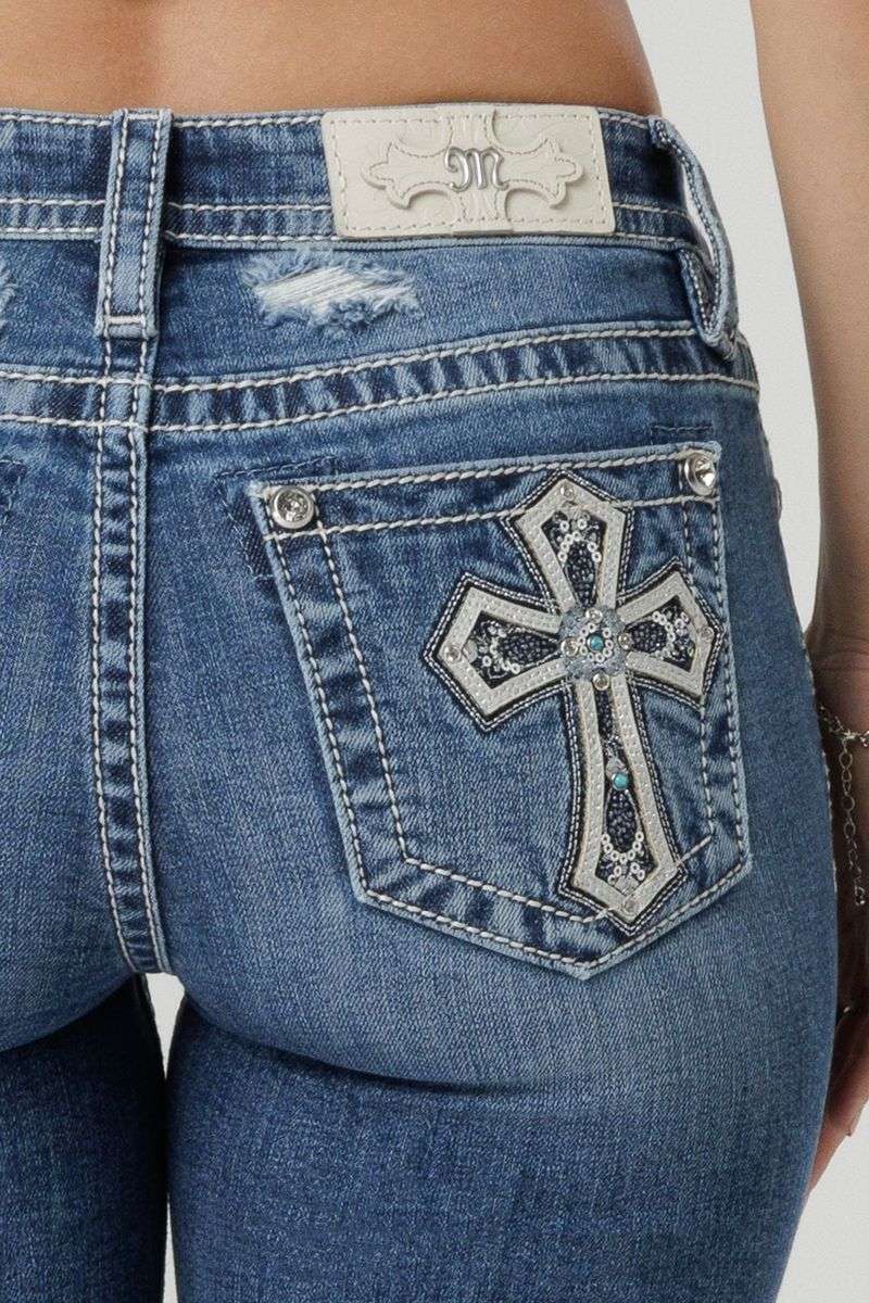 Bedazzled Pocket Jeans: Attention-Drawing Disaster