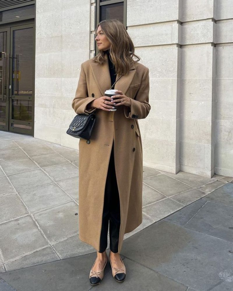 Camel Coat Over Monochrome Outfit