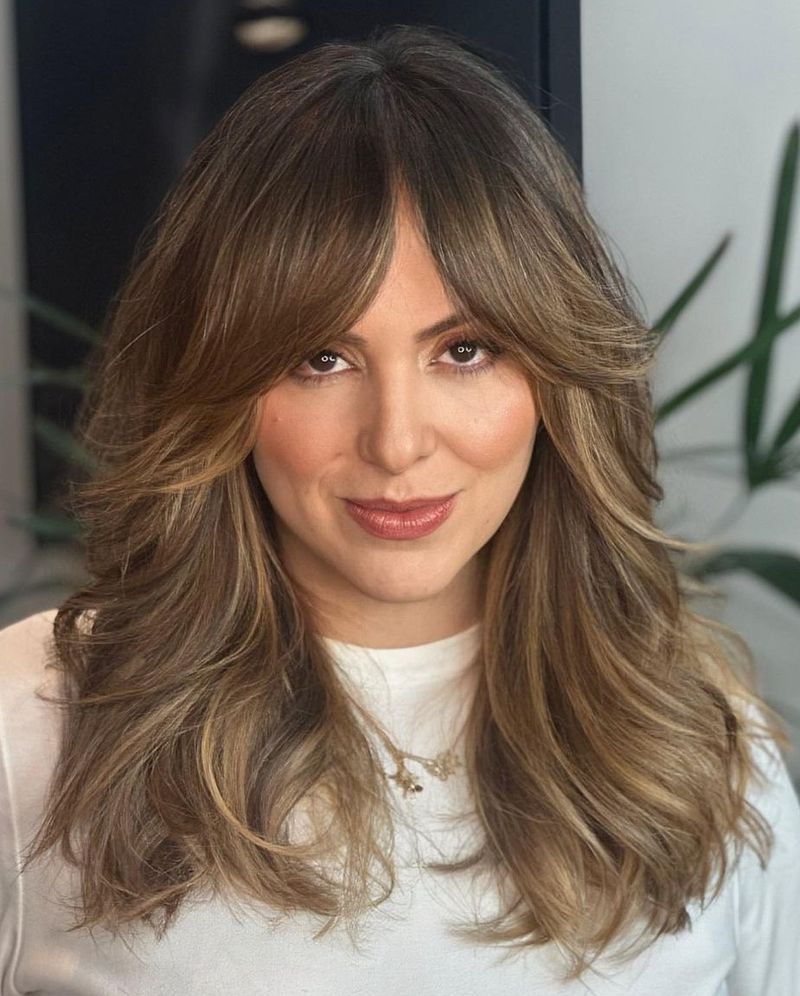 The Layered Cut with Curtain Bangs