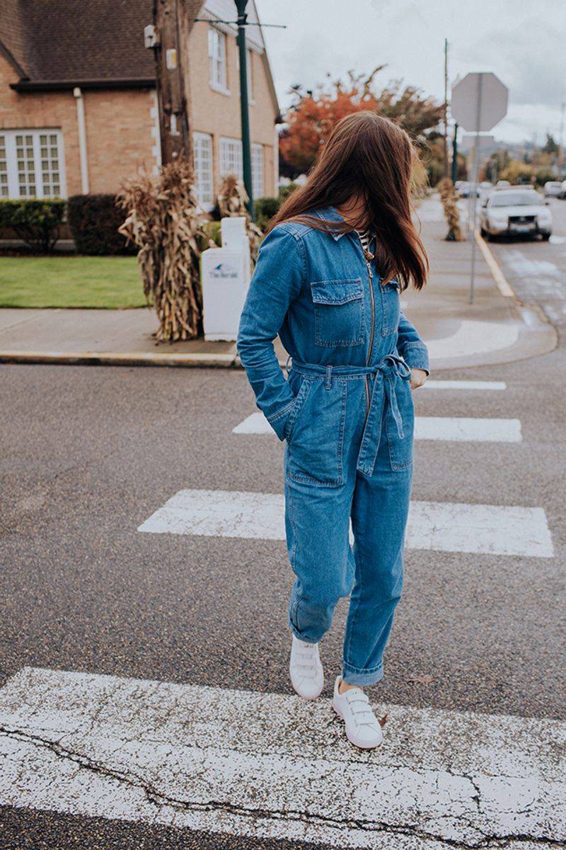 Denim Jumpsuit with White Sneakers