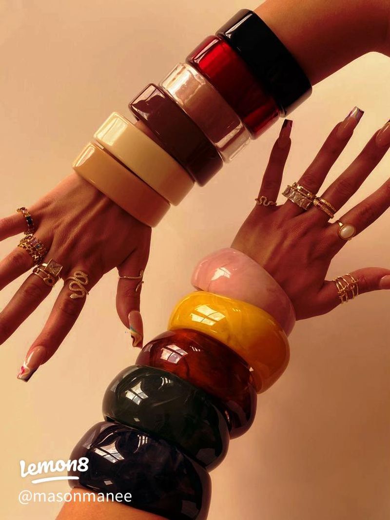 Bangle Bracelets Stacked To The Elbow