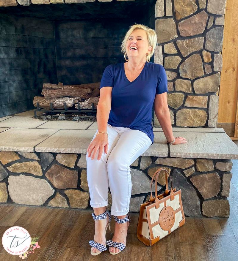 White Jeans with Blue Tunic and Red Accessories