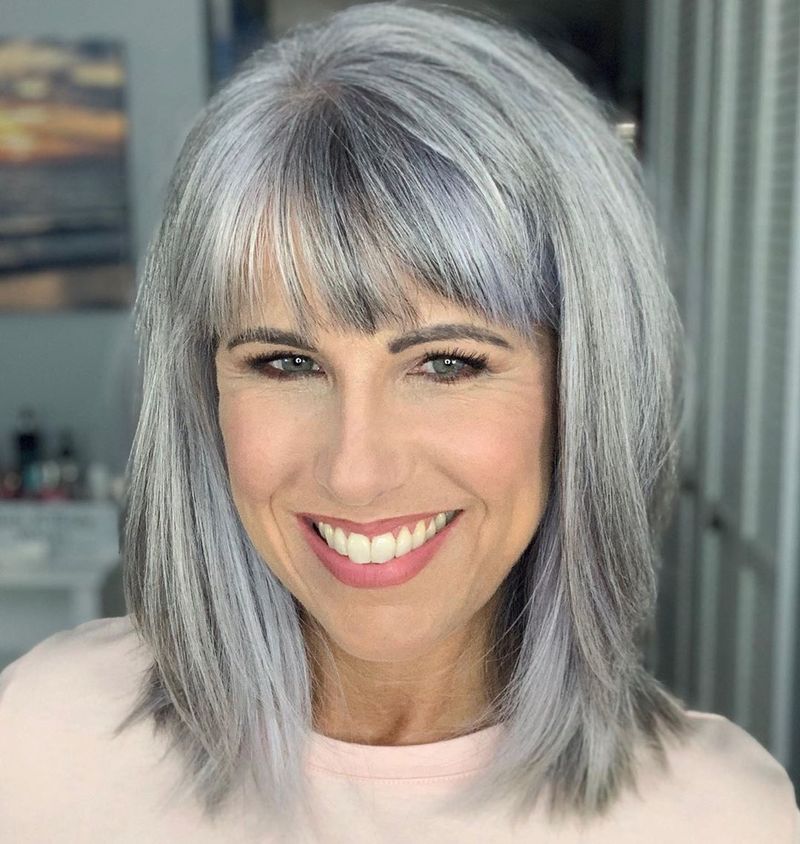 Mid-Length Cut with Face-Framing Layers