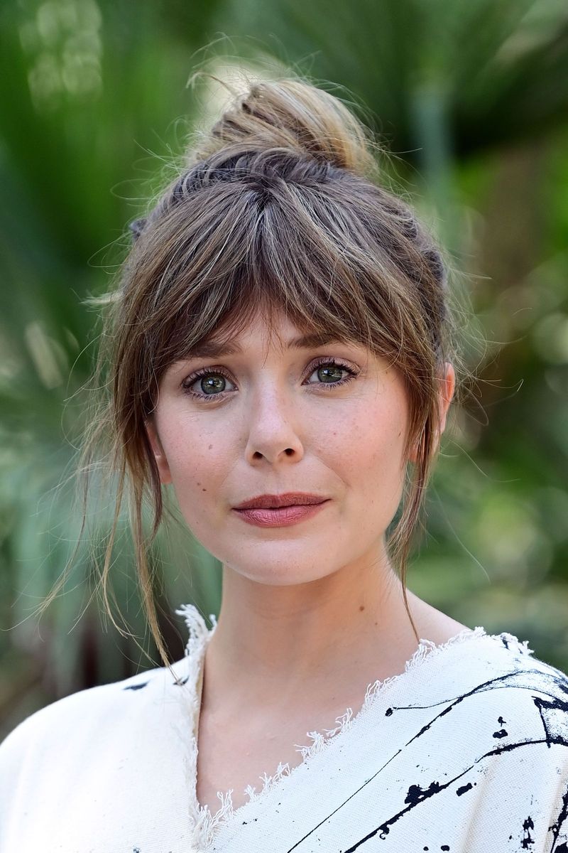 High Arched Bangs for Small Foreheads