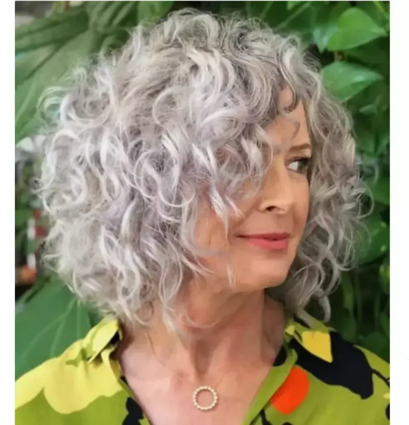 Shoulder-Length Curls with Side Part